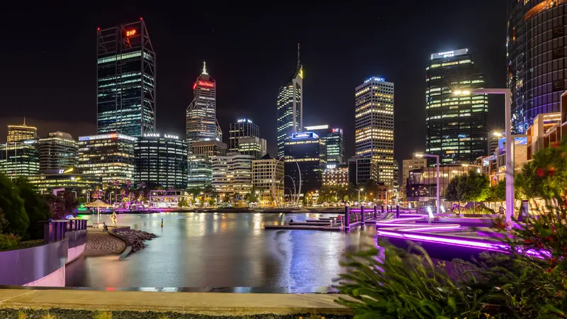 Perth city skyline across the Swan River at dusk